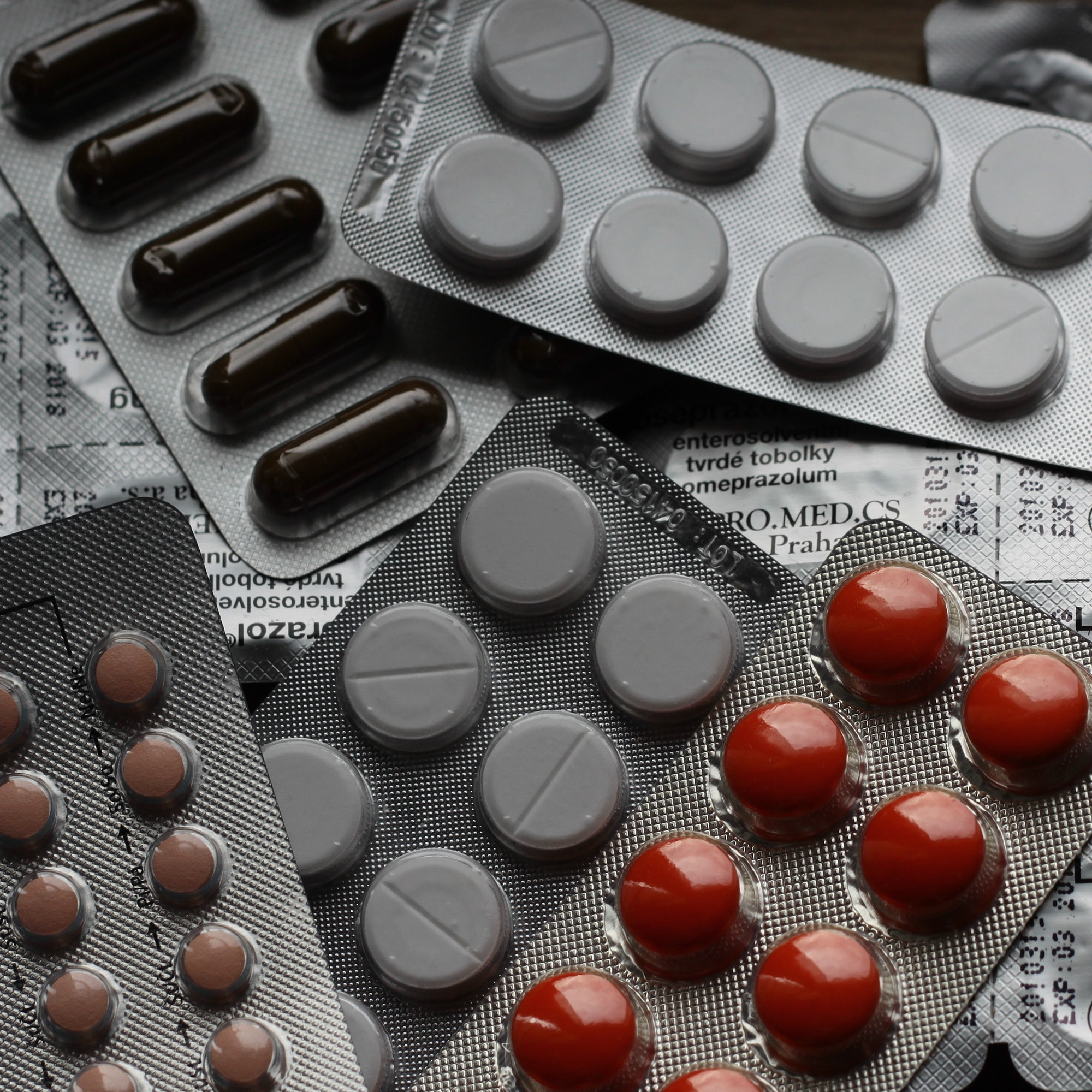 How can you protect your stomach when using NSAID painkillers?