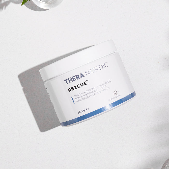 White container of Thera Nordic Rezcue supplement on a light surface.